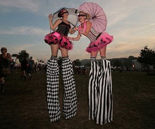 Face in a crowd Stilt Walkers